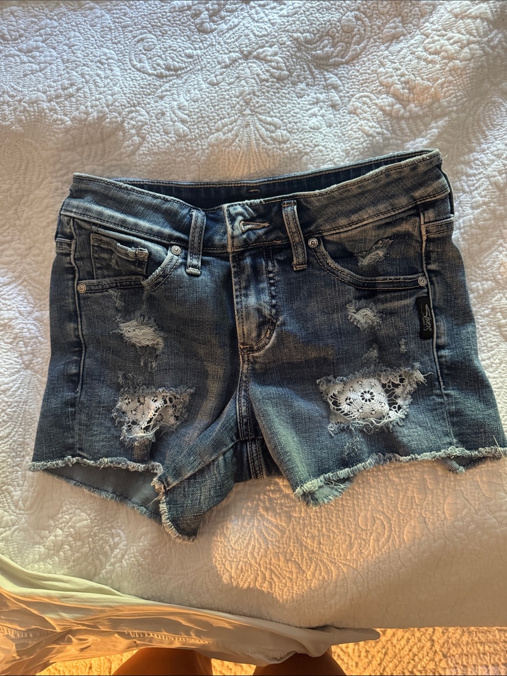 Silver Jeans Blue Distressed Denim Shorts with Lace Insets